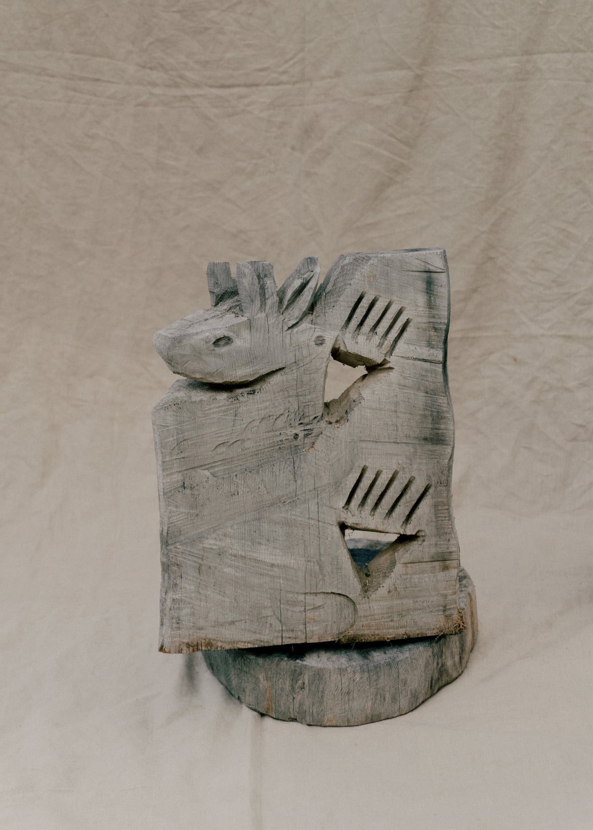 Untitled chainsaw carved relief